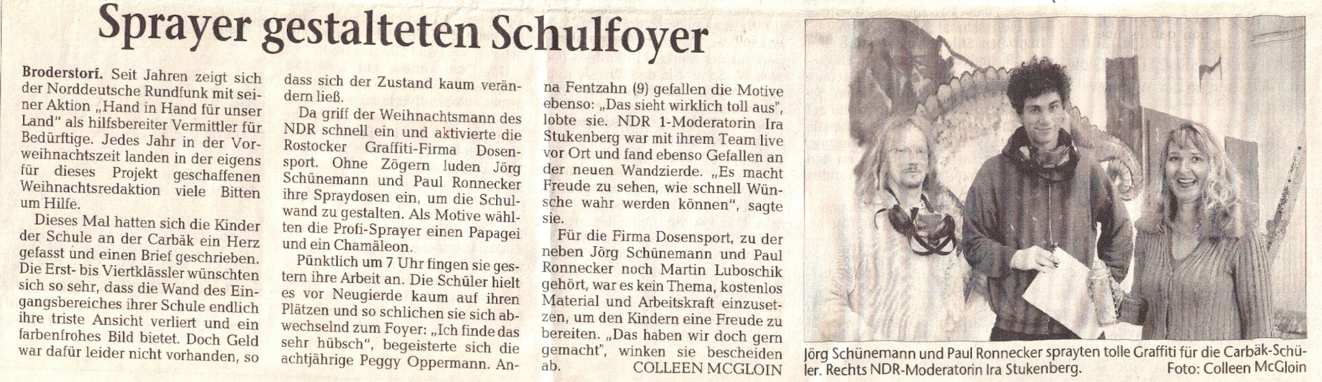 Artikel über die Gestaltung eines Schulfoyers durch professionelle Sprayer. Zeitungsbericht über das Schulprojekt, bei dem Dosensport-Künstler ein Foyer mit einem Papagei und einem Chamäleon gestalteten.